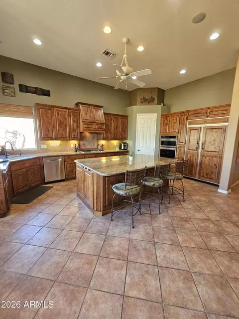 Kitchen - 1428 E Breezy Ct, Phoenix, AZ 85086 photo 7 of 9