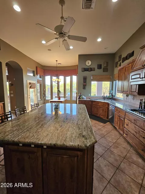 Kitchen - 1428 E Breezy Ct, Phoenix, AZ 85086 photo 3 of 9