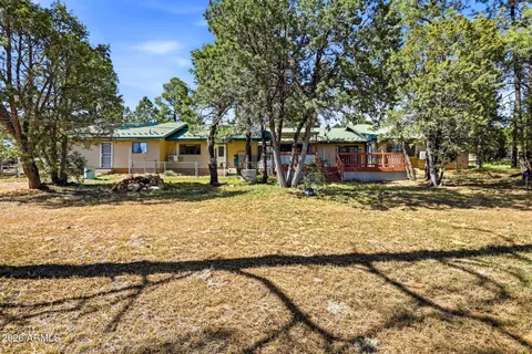 Exterior - 3121 Cedar Dr, Overgaard, AZ 85933 photo 2 of 9