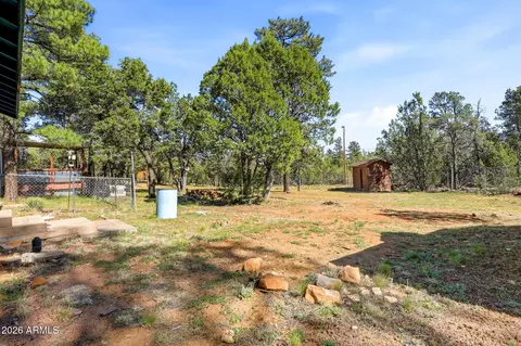 Exterior - 3121 Cedar Dr, Overgaard, AZ 85933 photo 4 of 9