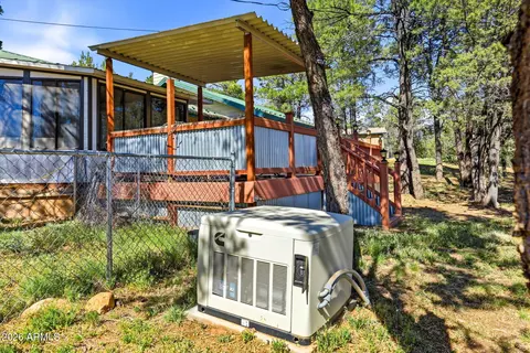 Exterior - 3121 Cedar Dr, Overgaard, AZ 85933 photo 5 of 9