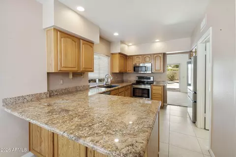Kitchen - 10913 E Flintlock Dr, Sun Lakes, AZ 85248 photo 3 of 4