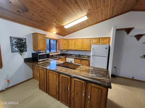 Kitchen - 2214 Sitgreaves Dr, Overgaard, AZ 85933 photo 2 of 4