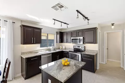 Kitchen - 3326 E Hononegh Dr, Phoenix, AZ 85050 photo 2 of 4