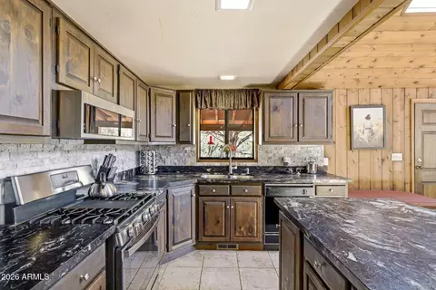 Kitchen - 2770 Apollo Cir, Overgaard, AZ 85933 photo 2 of 5
