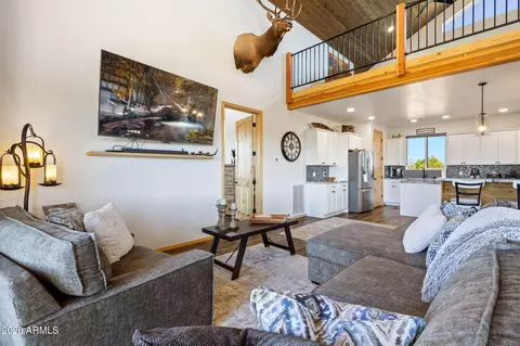 Living - 2258 Big Bear Cir, Overgaard, AZ 85933 photo 2 of 3
