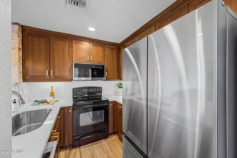 Kitchen - 815 E Rose Ln #116, Phoenix, AZ 85014 photo 2 of 2