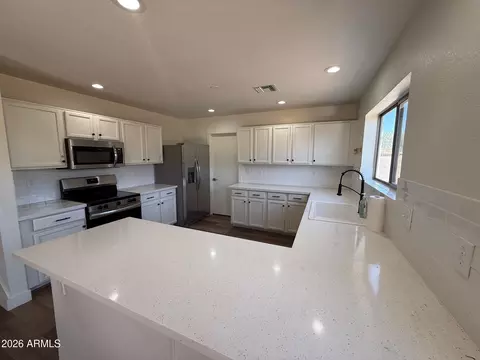 Kitchen - 11524 E Quade Ave, Mesa, AZ 85212 photo 2 of 4