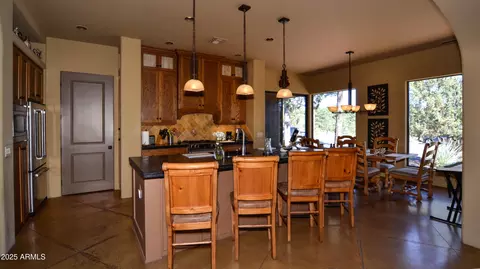Kitchen - 6682 W Windsong Ln, Pine, AZ 85544 photo 4 of 4