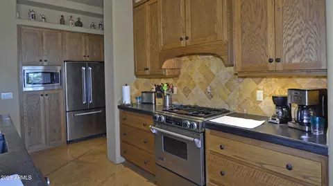 Kitchen - 6682 W Windsong Ln, Pine, AZ 85544 photo 2 of 4
