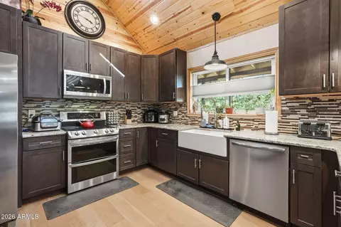 Kitchen - 2060 Gilbert Ln, Overgaard, AZ 85933 photo 3 of 6