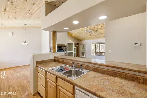 Kitchen - 2348 S Buffalo Loop, Overgaard, AZ 85933 photo 3 of 3