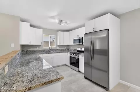 Kitchen - 8901 W Vale Dr, Phoenix, AZ 85037 photo 3 of 4