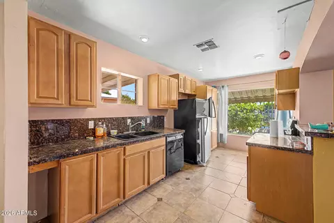Kitchen - 708 E Pepper Pl, Mesa, AZ 85203 photo 1 of 2