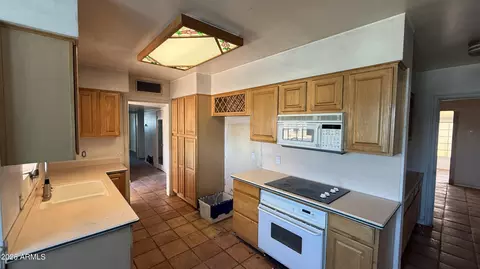 Kitchen - 1315 E Pepper Pl, Mesa, AZ 85203 photo 1 of 2