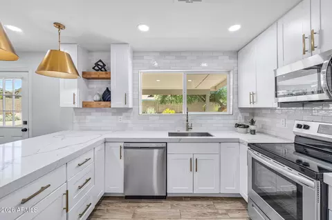 Kitchen - 833 E Le Marche Ave, Phoenix, AZ 85022 photo 2 of 3