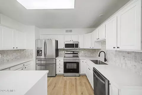 Kitchen - 2702 E Grovers Ave, Phoenix, AZ 85032 photo 4 of 4