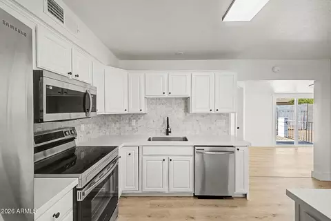 Kitchen - 2702 E Grovers Ave, Phoenix, AZ 85032 photo 3 of 4
