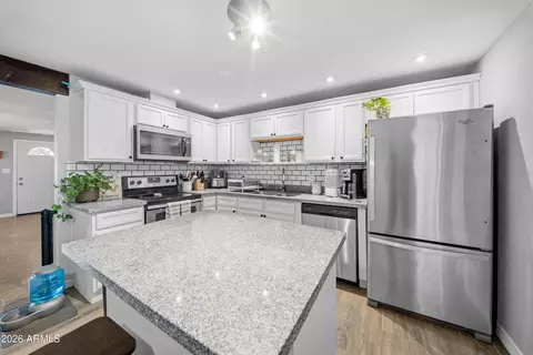 Kitchen - 3624 E Captain Dreyfus Ave, Phoenix, AZ 85032 photo 1 of 3