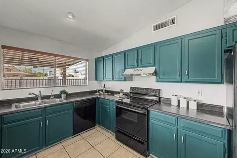 Kitchen - 4860 E Capistrano Ave, Phoenix, AZ 85044 photo 2 of 3