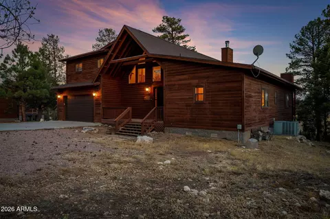 Exterior - 2231 Fairway Dr, Overgaard, AZ 85933 photo 3 of 14