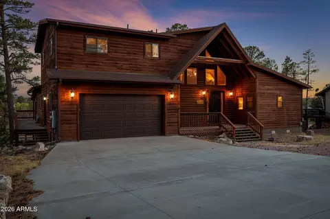 Exterior - 2231 Fairway Dr, Overgaard, AZ 85933 photo 2 of 14