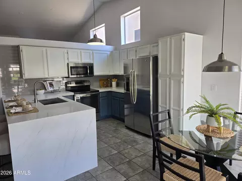 Kitchen - 1921 E Aire Libre Ave, Phoenix, AZ 85022 photo 3 of 3
