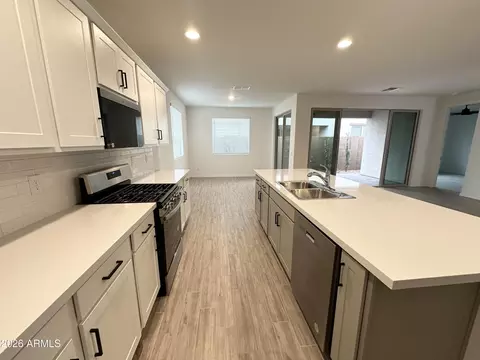 Kitchen - 9354 E Spiral Ave, Mesa, AZ 85212 photo 5 of 7