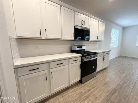 Kitchen - 9354 E Spiral Ave, Mesa, AZ 85212 photo 3 of 7