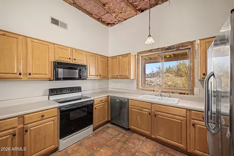 Kitchen - 407 E Honda Bow Rd, Phoenix, AZ 85086 photo 2 of 3