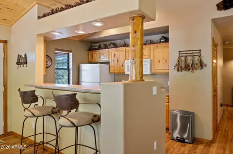 Kitchen - 2335 Buffalo Loop N, Overgaard, AZ 85933 photo 2 of 5