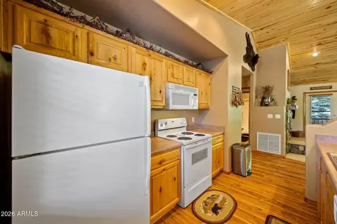 Kitchen - 2335 Buffalo Loop N, Overgaard, AZ 85933 photo 3 of 5
