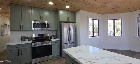Kitchen - 2870 Cedar Rdg, Overgaard, AZ 85933 photo 4 of 4