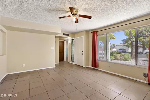 Living - 8717 W Clarendon Ave, Phoenix, AZ 85037 photo 2 of 3