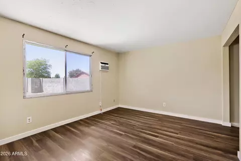 Living - 8717 W Clarendon Ave, Phoenix, AZ 85037 photo 3 of 3