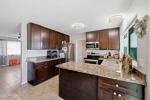 Kitchen - 2566 E Villa Rita Dr, Phoenix, AZ 85032 photo 2 of 4