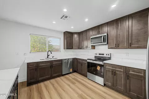 Kitchen - 916 E Harwell Rd, Phoenix, AZ 85042 photo 1 of 2