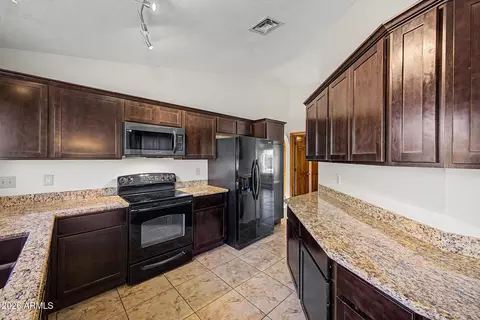 Kitchen - 807 E Aire Libre Ave, Phoenix, AZ 85022 photo 3 of 4