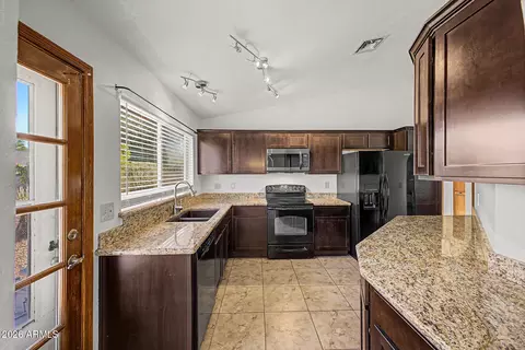Kitchen - 807 E Aire Libre Ave, Phoenix, AZ 85022 photo 2 of 4