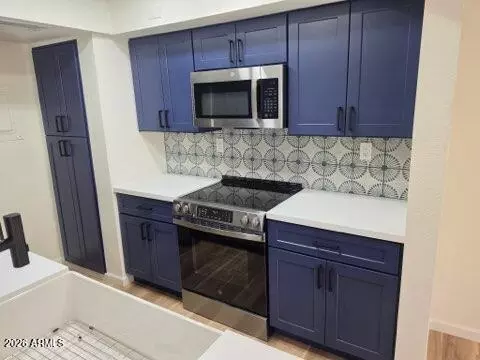 Kitchen - 712 Eugie Ave, Phoenix, AZ 85022 photo 2 of 3