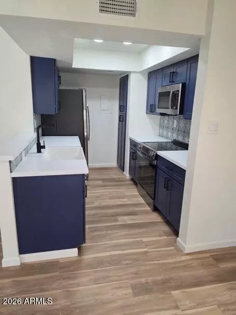 Kitchen - 712 Eugie Ave, Phoenix, AZ 85022 photo 3 of 3