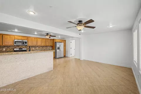 Living - 530 E Rose Ln, Phoenix, AZ 85012 photo 6 of 8