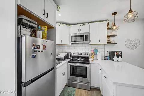 Kitchen - 1447 E Mountain View Rd, Phoenix, AZ 85020 photo 3 of 3