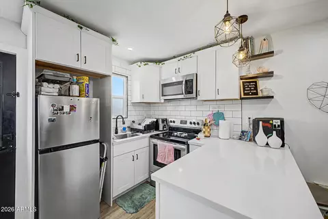 Kitchen - 1447 E Mountain View Rd, Phoenix, AZ 85020 photo 2 of 3