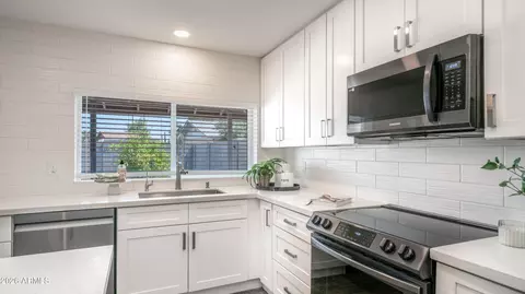 Kitchen - 940 E Harmony Ave, Mesa, AZ 85204 photo 4 of 7