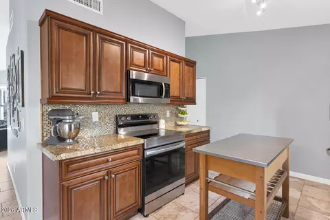 Kitchen - 4834 E Mossman Rd, Phoenix, AZ 85054 photo 2 of 3
