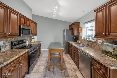 Kitchen - 4834 E Mossman Rd, Phoenix, AZ 85054 photo 3 of 3
