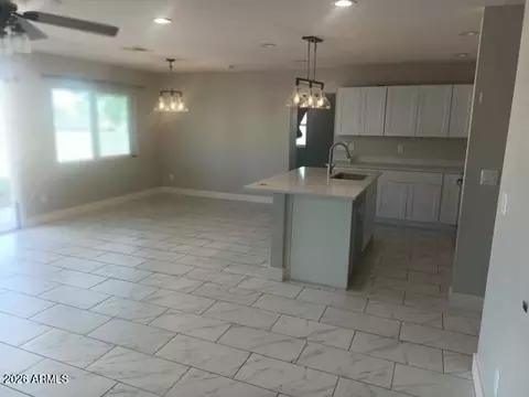 Living - 302 3rd Ave E, Buckeye, AZ 85326 photo 3 of 6