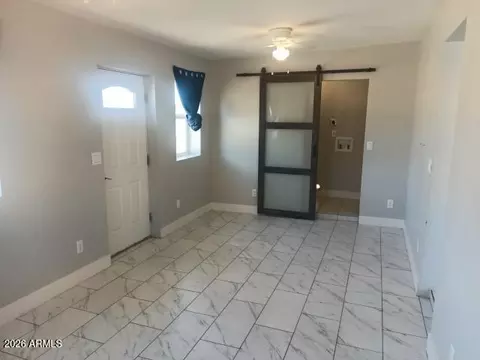 Living - 302 3rd Ave E, Buckeye, AZ 85326 photo 4 of 6