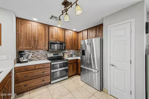 Kitchen - 10228 E Crescent Ave, Mesa, AZ 85208 photo 3 of 3